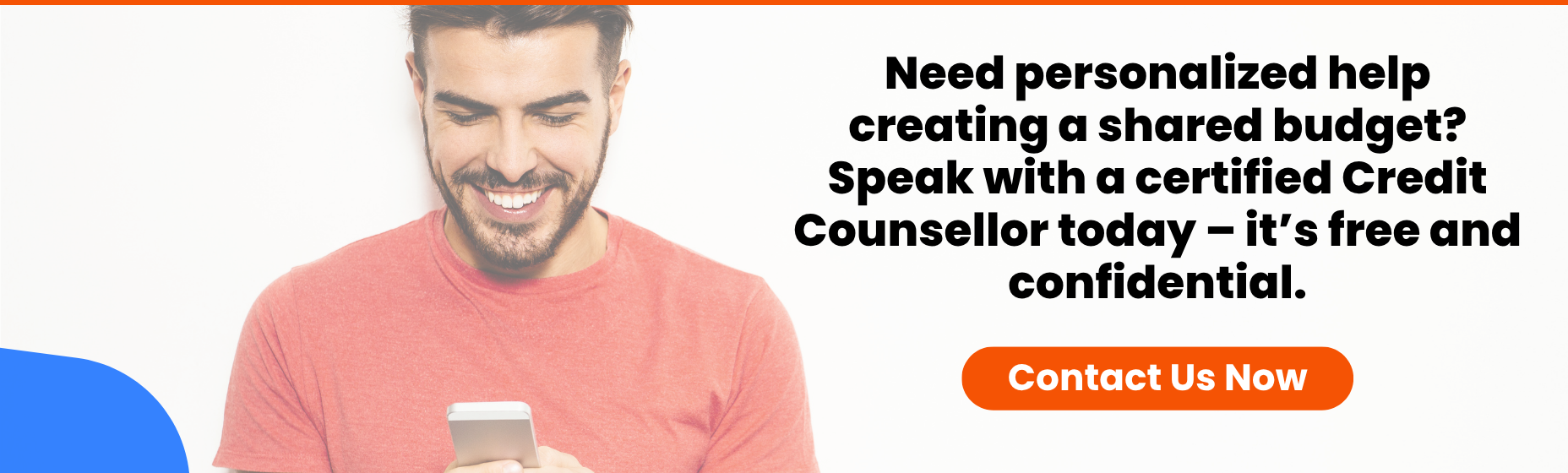 man smiling and looking at his phone