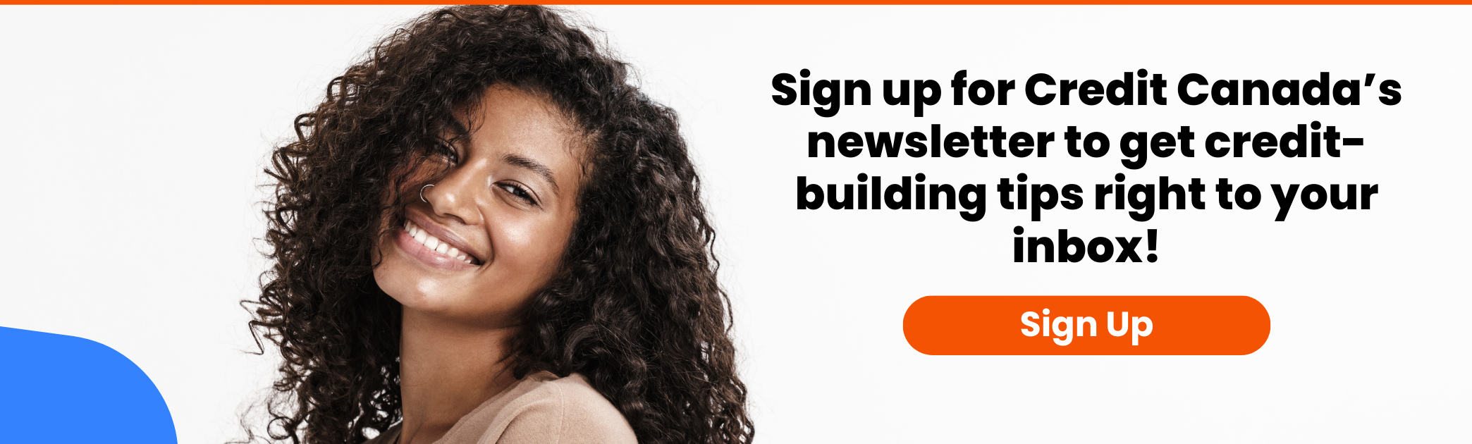 woman with curly hair smiling