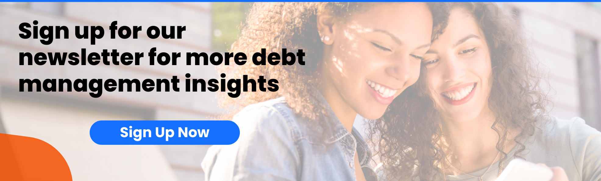 two women smiling and signing up for a newsletter on a mobile phone